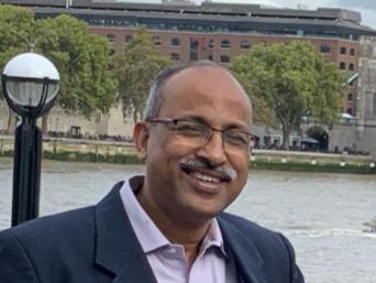 Anand DK, BArch, FIIA, MRICS (UK)